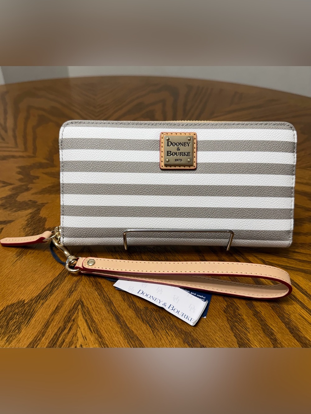 Dooney & Bourke Gray and White Striped Zip Around Wristlet with Tan Strap